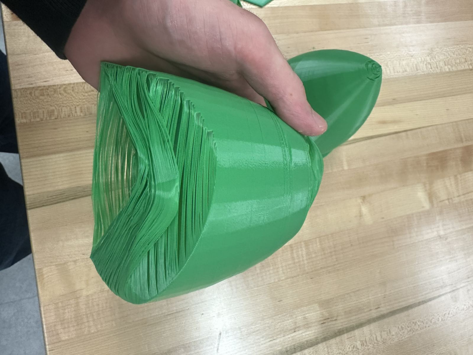 Failed nose cone print side view showing deformation